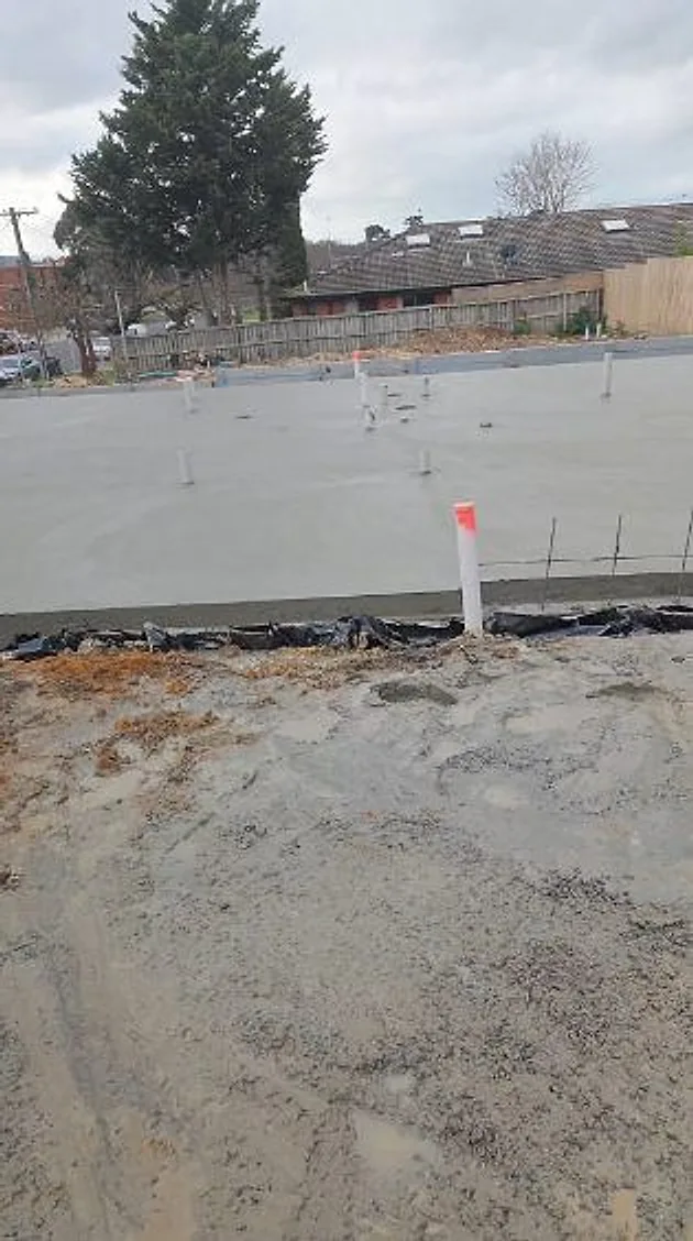 House slab poured with the plumbing set in