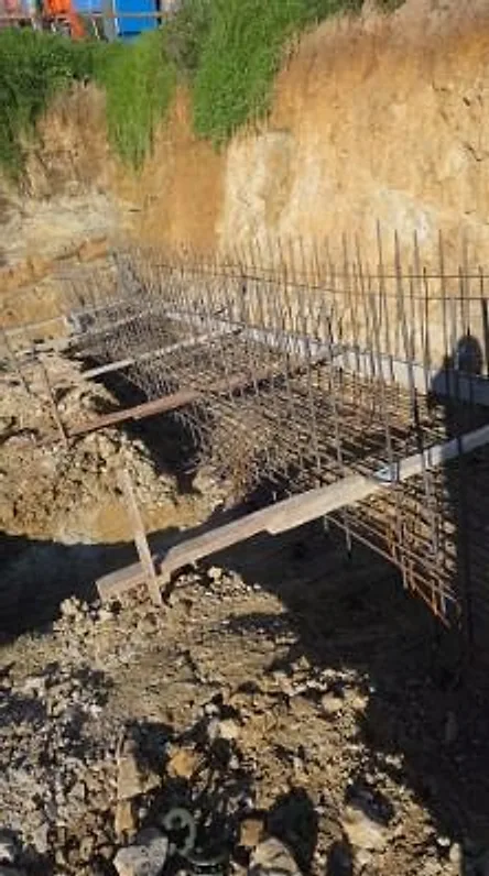 Reinforcing steel for a retaining wall footing